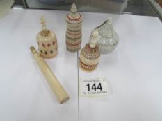 3 19th century ivory scent bottles, a 19th century needle case and one other item.