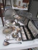 A mixed lot of silver plate including cased set of cutlery, 2 trays, 2 comports,