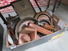A box of wooden items including elephant bookends etc.