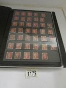 An album of 19th century British Victorian stamps including, penny black, penny red,