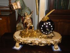 A large fabulous gilded brass and Shakespeare ball clock with quartz movement.