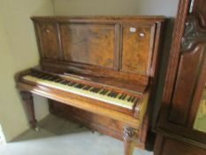 A Collard & Collard walnut cased piano.