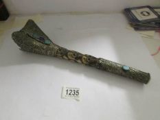 A rare Nepalese vintage Kangling flute (cow femur with white metal and coloured stones).