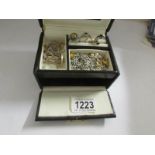 A mixed lot of rings, chains, earrings ect., including some silver and in jewellery box.