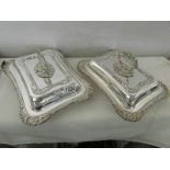 A pair of silver plate lidded entree dishes by J. H. Potter, Sheffield,.