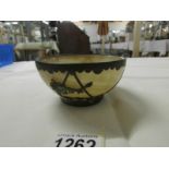 A 19th century Chinese bowl with metal frame (mark on base).