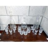 A quantity of glasses & 3 decanters