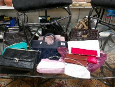 A quantity of handbags