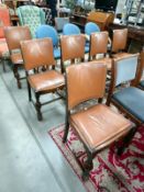 A set of 6 leather upholstered dining chairs