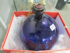 A late 18th century large glass witch ball in Bristol blue.