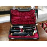A cased Yamaha clarinet with accessories