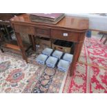 A mahogany fold over table.