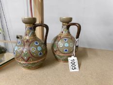 A pair of Edwardian Sarreguemines pottery jugs of Aesthetic design, stamped 1300.