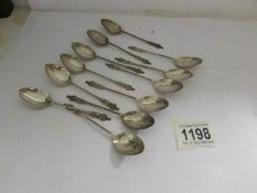 12 silver apostle spoons.