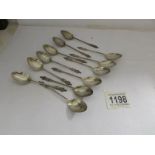 12 silver apostle spoons.