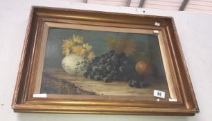 A framed and glazed still life study with grapes.