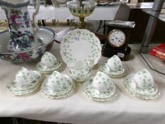 An Aynsley clover leaf porcelain tea set.