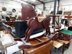 A wooden rocking horse