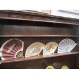 4 decorative fans.