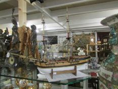 A model sailing ship being H.M Brig supply.