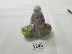 A Royal Doulton 'Miniature Street Vendors' series figure, Granny's Heritage, HN4811.