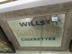 A Will's gold flake cigarettes mirror.