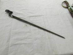 A bayonet, WDE46834, marked with eastern lettering, (64.15cm long.