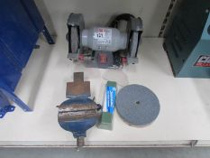 A PP150Bg Performance power grinder, spare grinding discs and a small bench vice.