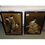 A pair of framed and glazed Japanese Geisha painted panels.