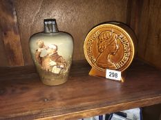 A 2 new pence money box and an 'Old Simon the Cellarer' jug.