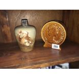 A 2 new pence money box and an 'Old Simon the Cellarer' jug.