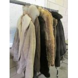 A quantity of fur & faux fur coats and jackets, various styles and sizes.