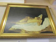 A gilt framed and glazed print of reclining nude lady,.