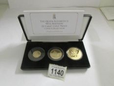 The Queen Elizabeth II 90th birthday 22ct gold proof coin collection, £5, £2, £1.