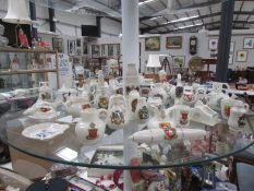 A large collection of crested china.