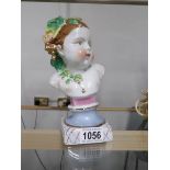 A 19th century continental cherub bust.