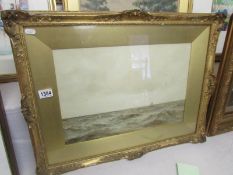 A gilt framed seascape entitled 'Grey Skies and seas off England' by James Aitken.