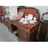 A Victorian mahogany twin pedestal sideboard.