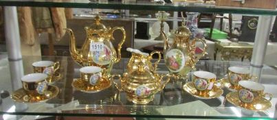 A fine gold decorated Czechoslovakian tea set with 'Renaissance scene'.