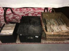 A large quantity of 45 rpm records in 3 boxes.