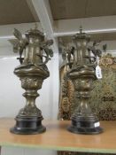 A pair of 19th century lidded urns.
