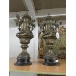 A pair of 19th century lidded urns.