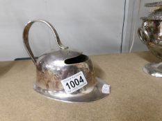 A Hukin & Heath Christopher Dresser design silver plate helmet shaped spoon warmer.