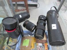 3 camera lenses (2 with cases).