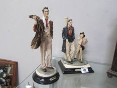 2 'Sebastian' figurines.