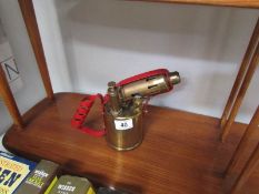 A brass 'Monitor' No.190 blow lamp.