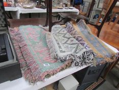 7 assorted rugs/throws.