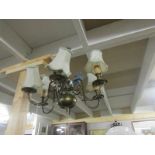 A 6 lamp brass ceiling light.