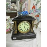 An America slate mantel clock marked on mechanism 'Ansonia Clock Co., USA, New York.