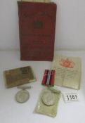 A WW2 Defence medal and a WW2 war medal with original box and supporting documentation including